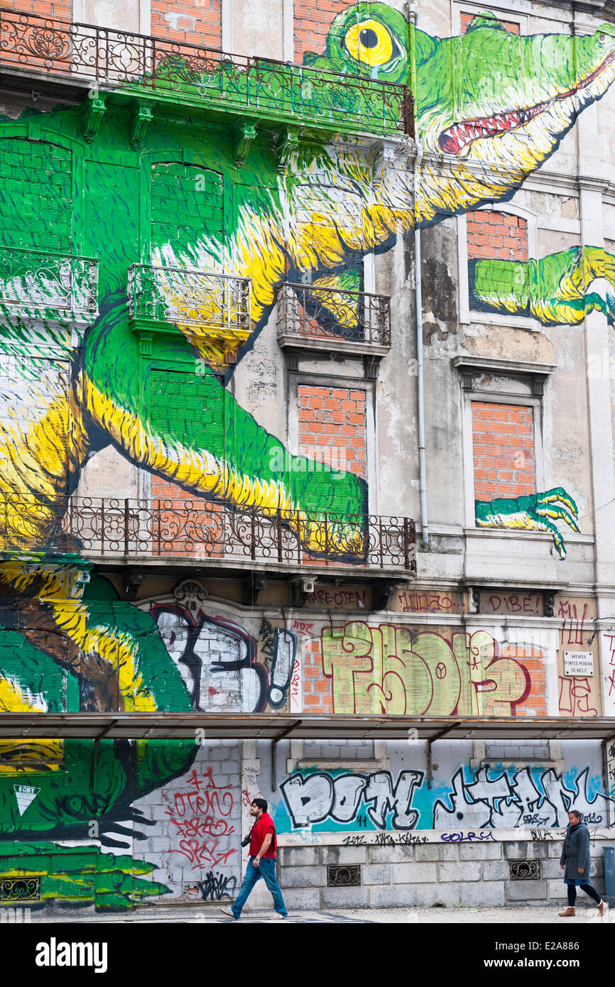 Portugal, Lisbon, the italien artist BLU joined with the bresilian Os Gemeos to realize a gigantic fresco Stock Photo