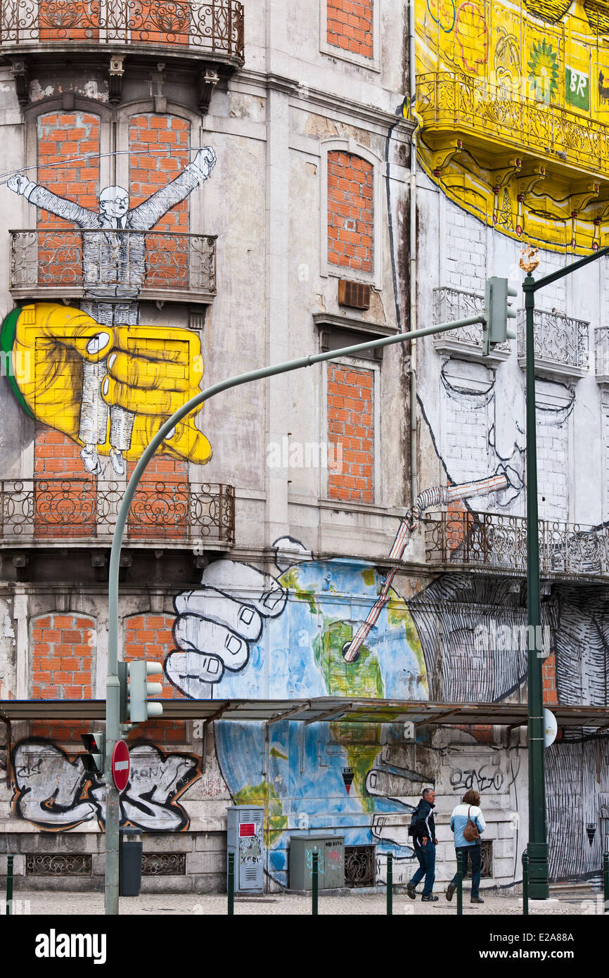 Portugal, Lisbon, the italien artist BLU joined with the bresilian Os Gemeos to realize a gigantic fresco Stock Photo