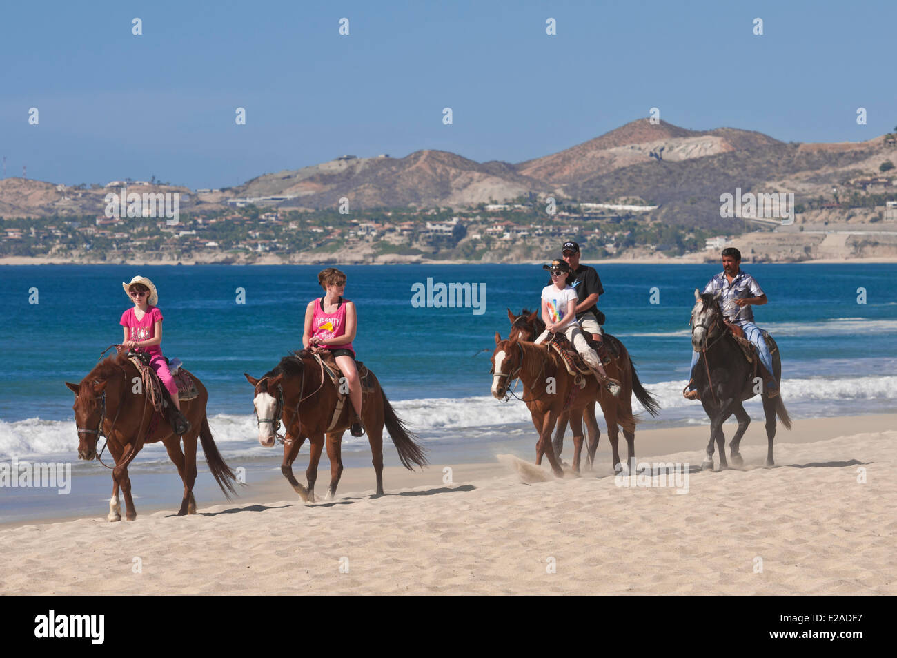 Mexico, Baja California Sur state, San Jose del Cabo, horse ride on the beach Stock Photo
