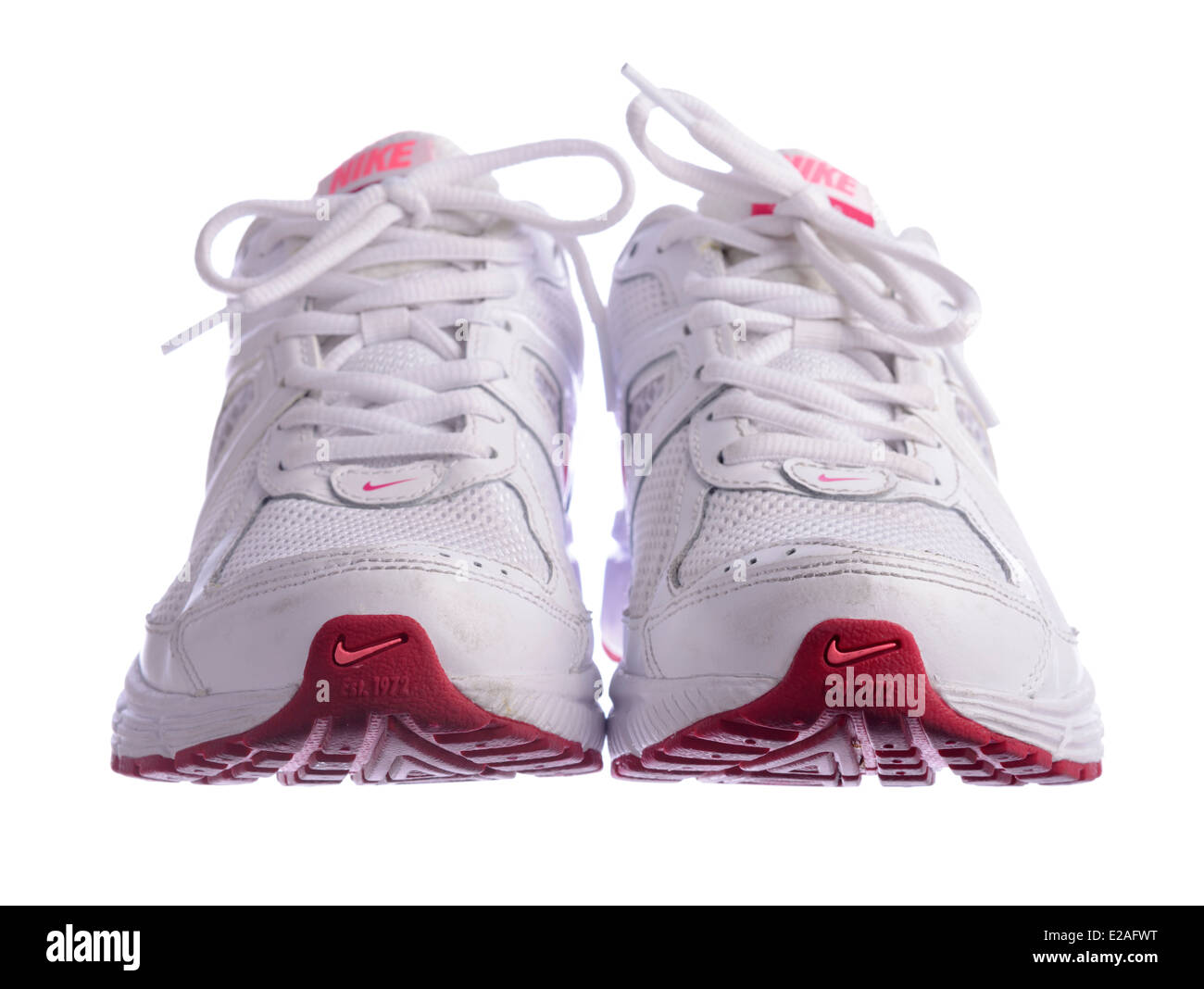 White Nike Dart 9 running shoes isolated on white background Stock Photo -  Alamy