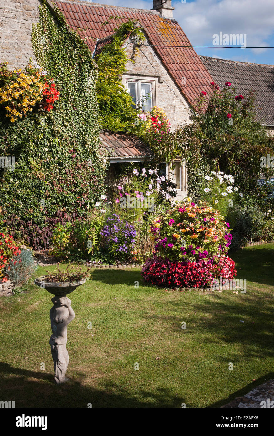 Colourful cottage front garden in UK Stock Photo