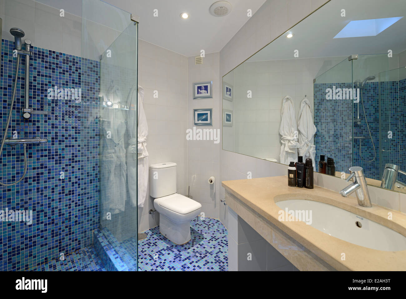Modern bathroom with blue tiles Stock Photo