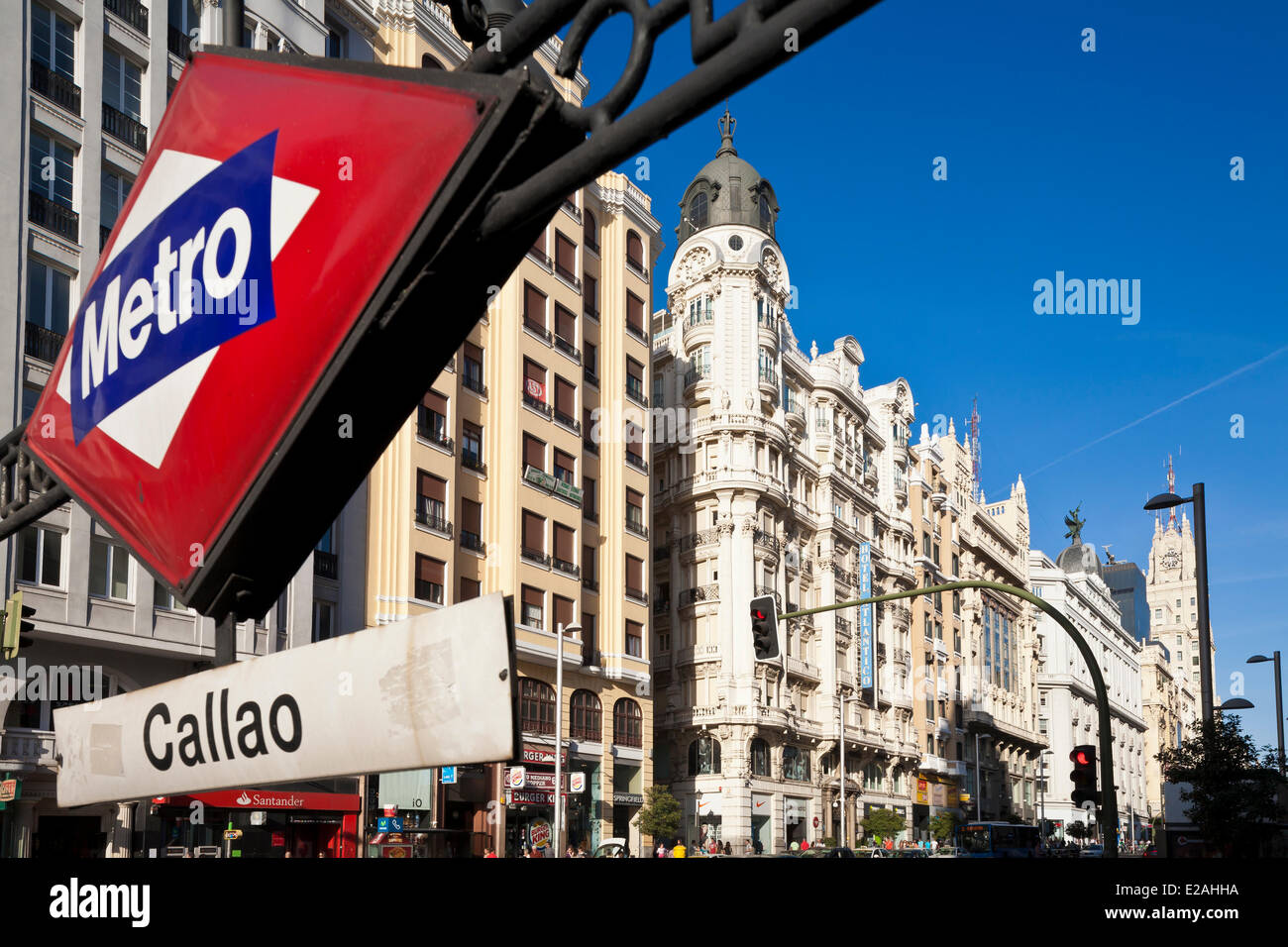 Spain, Madrid, Gran Via, downtown main artery with buildings from the early 20th century and the Callao metro station Stock Photo