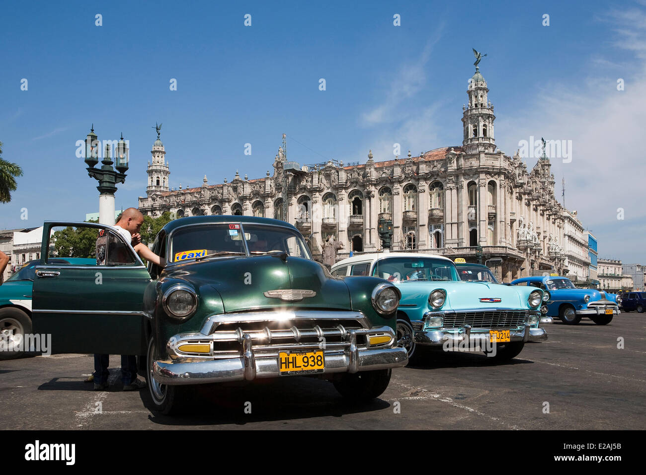 Cuba, Ciudad de La Habana Province, Havana, Centro Habana District, American car in front of the Havana Great Theater (Gran Stock Photo