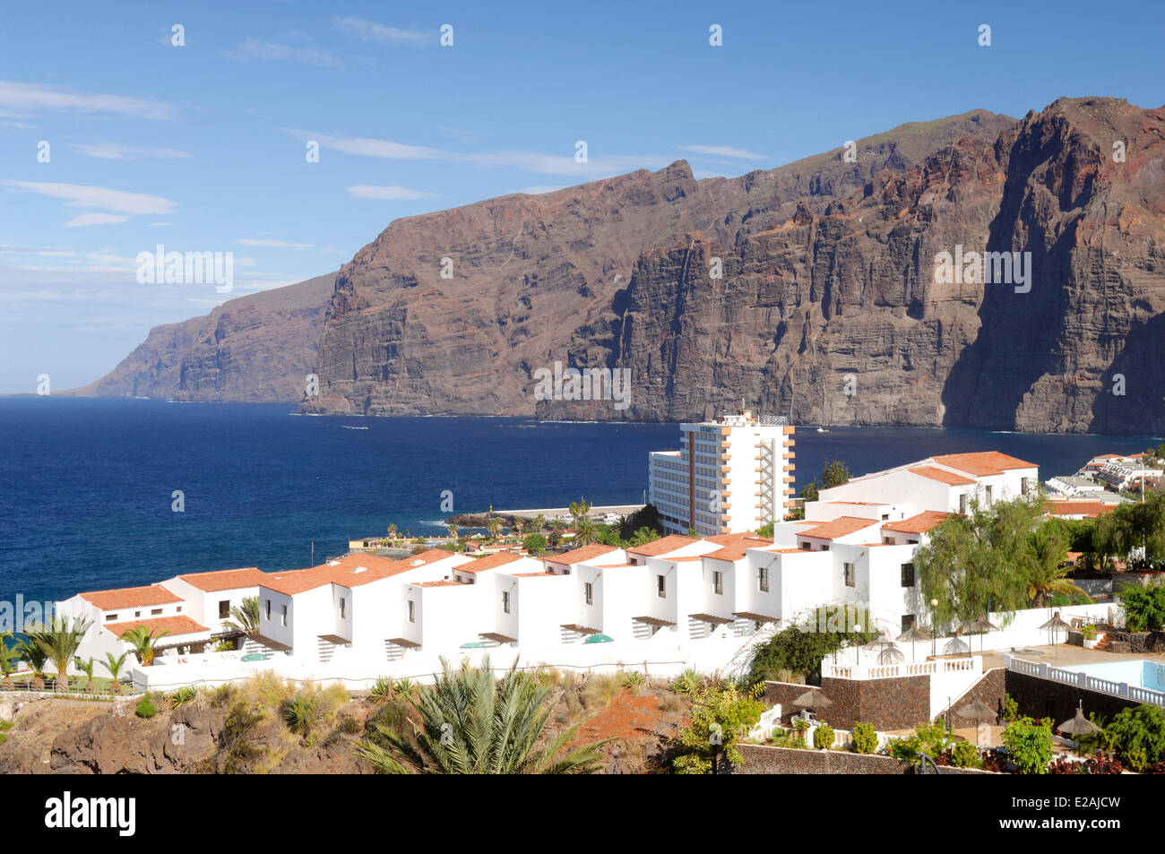 Spain, Canary Islands, Tenerife, Los Gigantes, Cliffs and houses in the Bay of Los Gigantes Stock Photo