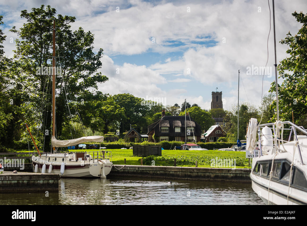 Yachts moored at Village of Ranworth. Malthouse Broad. Norfolk Broads England Britain Stock Photo