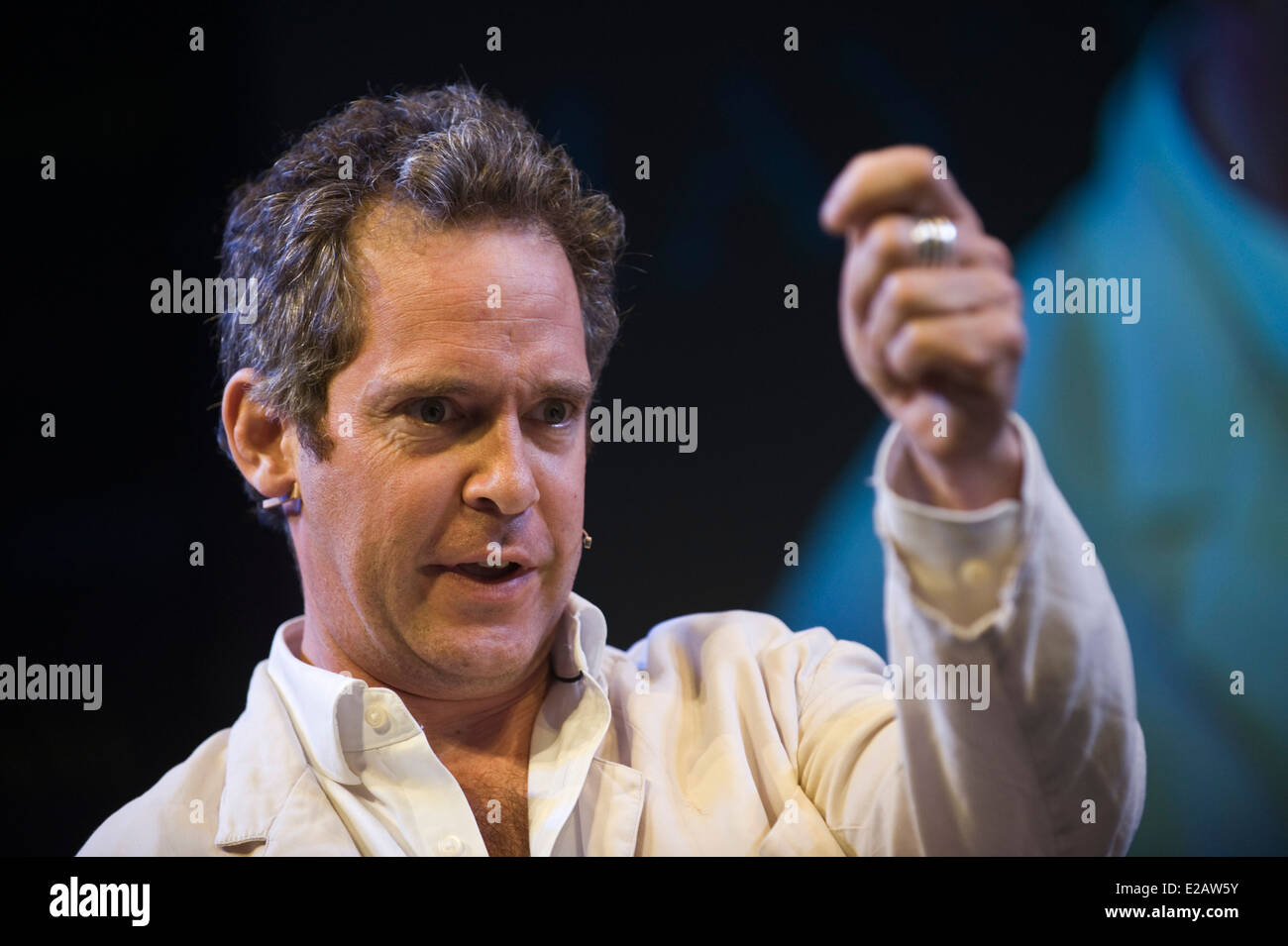 Actor Tom Hollander discusses the BBC TV sitcom Rev in which he plays  Reverend Adam Smallbone on stage at Hay Festival 2014 Stock Photo - Alamy