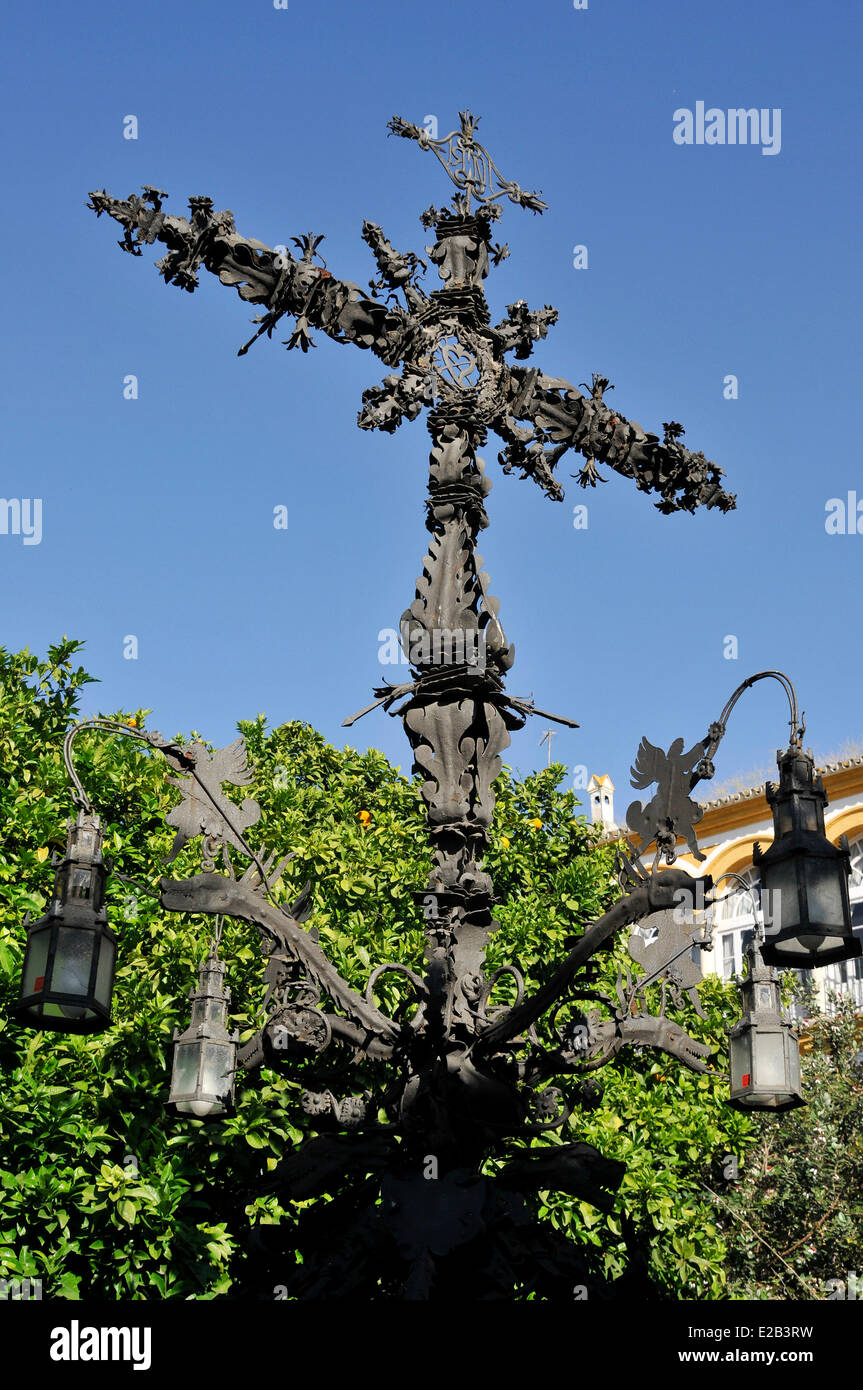 Spain, Andalucia, Seville, district of Santa Cruz, wrought iron cross of Cerrateria 1612 Stock Photo