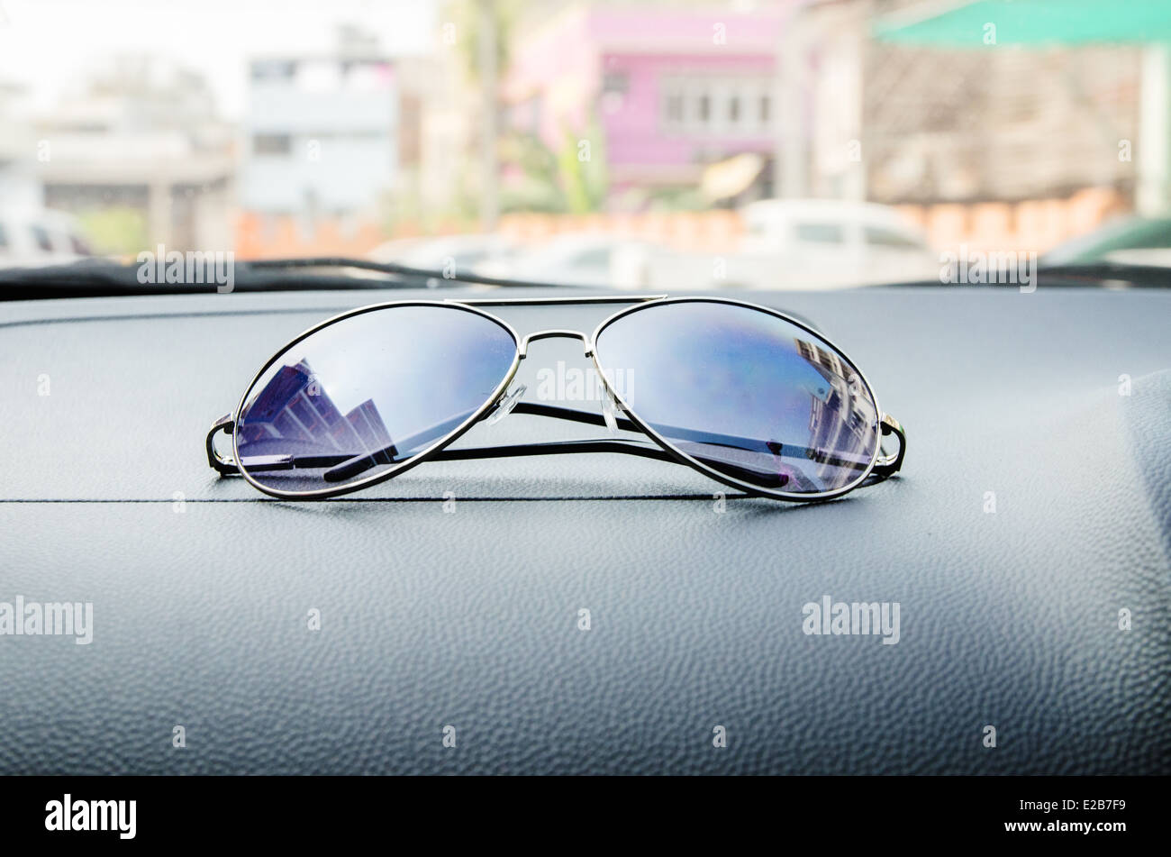 Sunglasses on the car Stock Photo Alamy