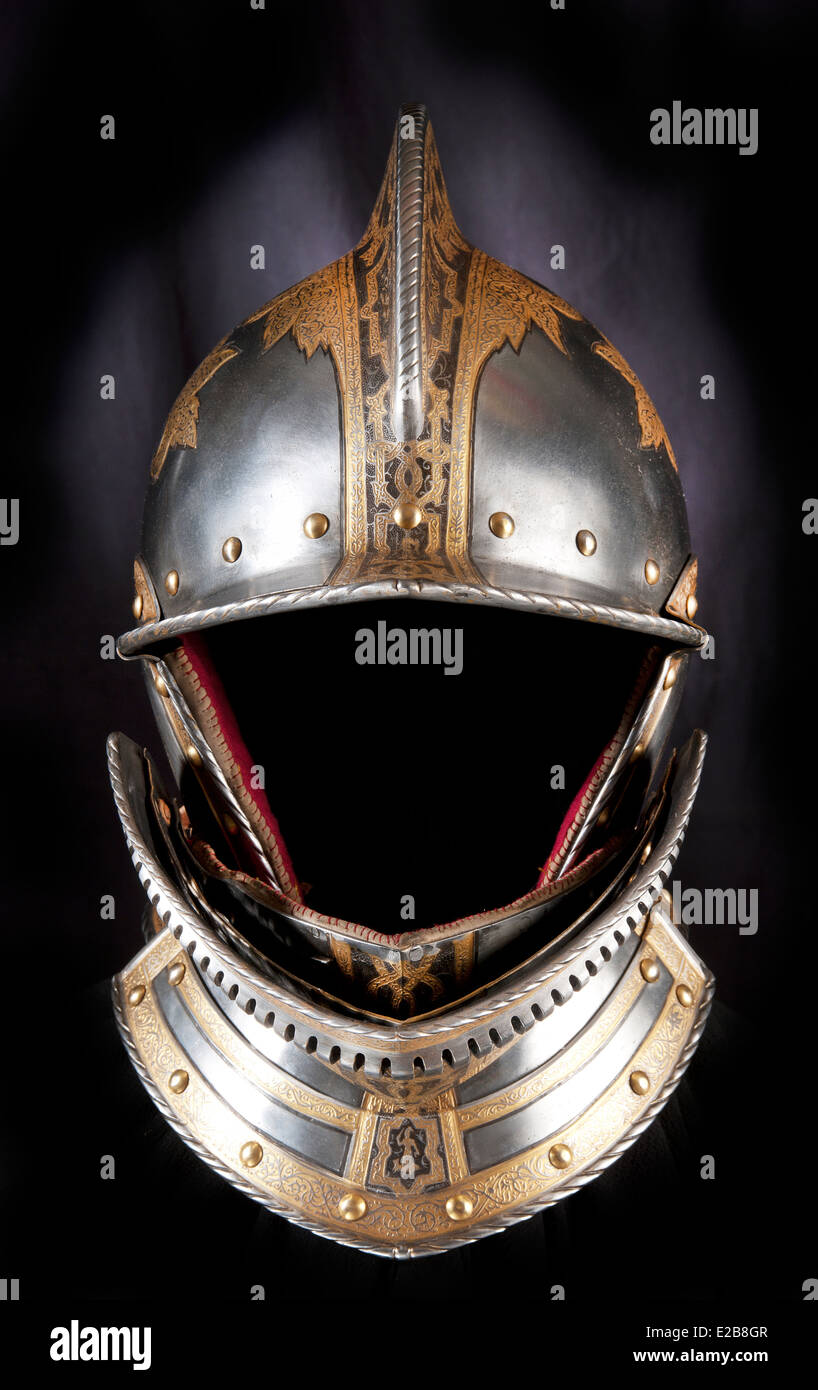 Iron helmet of the medieval knight. Very heavy headdress Stock Photo