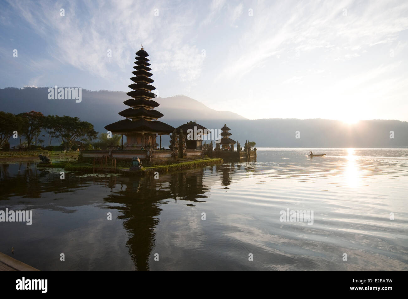 Indonesia, Bali, near Bedugul, temple Pura Ulun Danu on Bratan lake at sunrise and its reflection on the lake Stock Photo