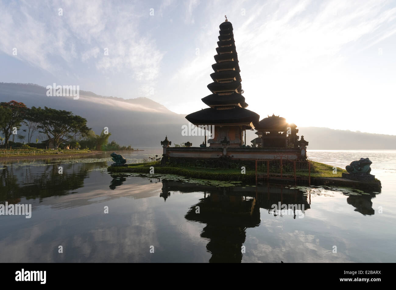 Indonesia, Bali, near Bedugul, temple Pura Ulun Danu on Bratan lake at sunrise and its reflection on the lake Stock Photo