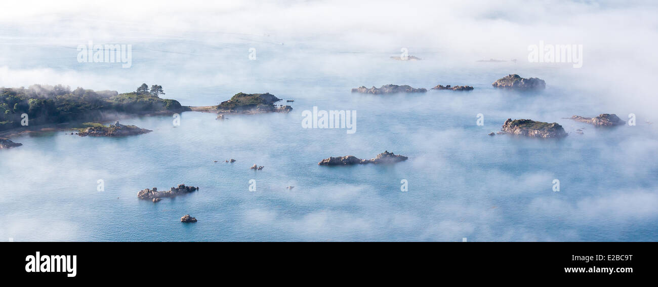 France, Cotes d'Armor, Ploubazlanec, sea mist on the coast (aerial view) Stock Photo