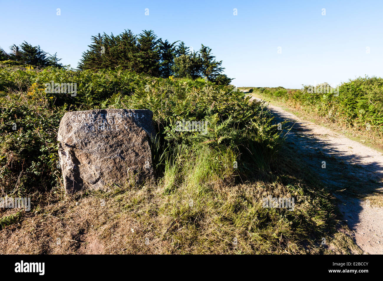 France, Vendee, Ile d'Yeu, trek and direction signs on a rock Stock Photo