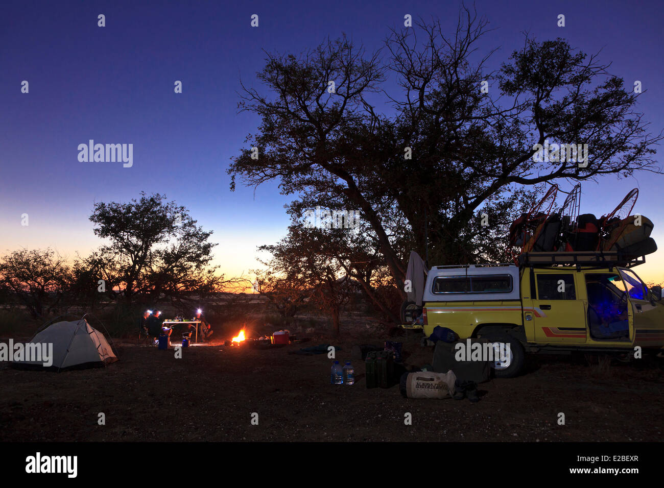 Namibia, Damaraland, near Palmwag, bivouac and camp fire in the bush Stock Photo