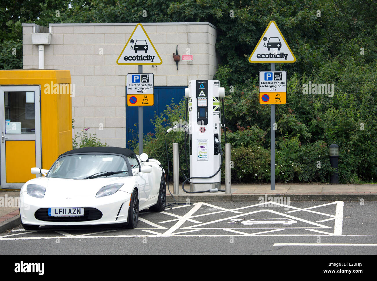 Tesla Roadster Electric Car Supercar On Charge At Heston