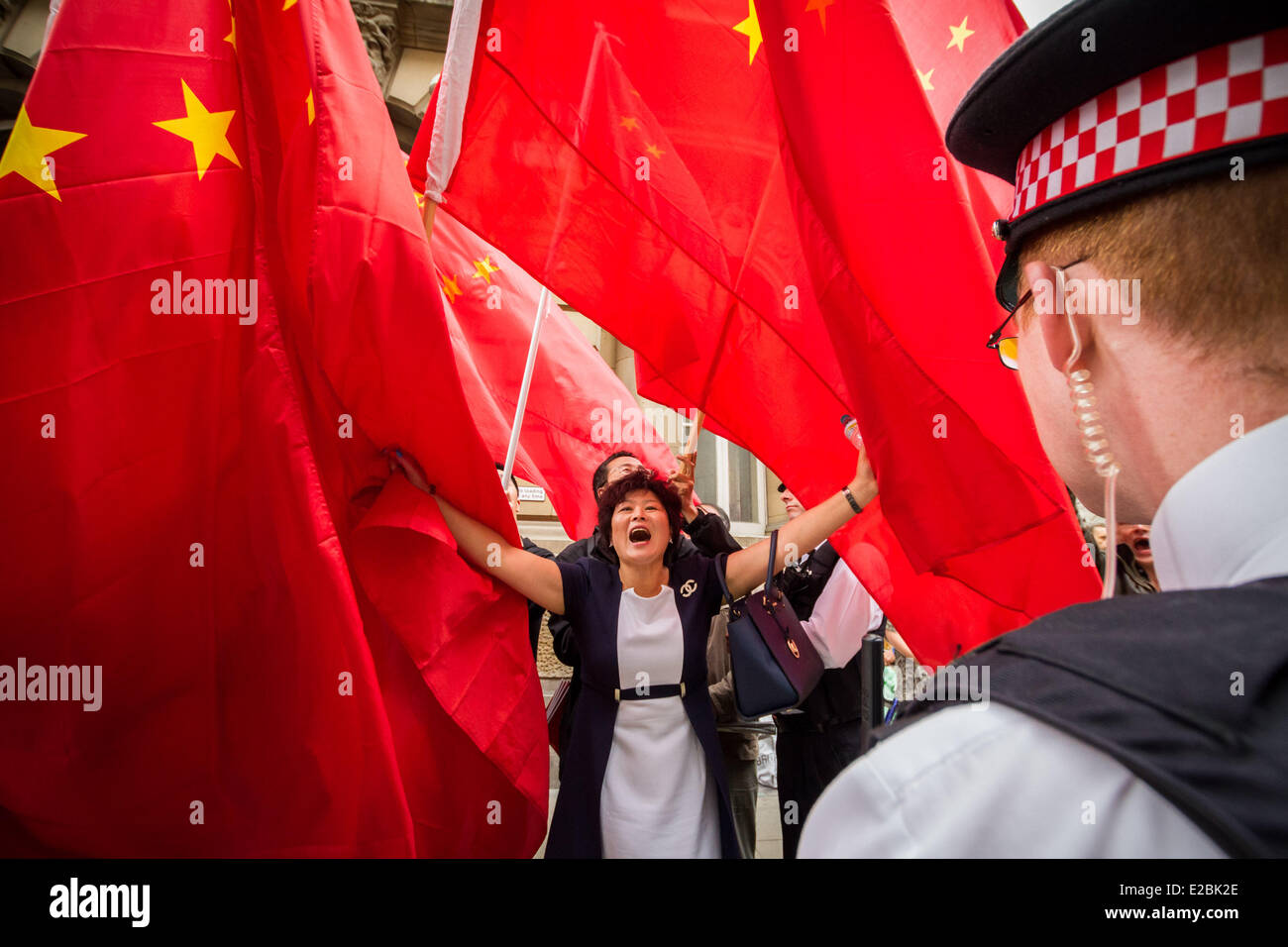 London, UK. 18th June, 2014. Free Tibet Protesters clash with pro Chinese government supporters in London Credit:  Guy Corbishley/Alamy Live News Stock Photo