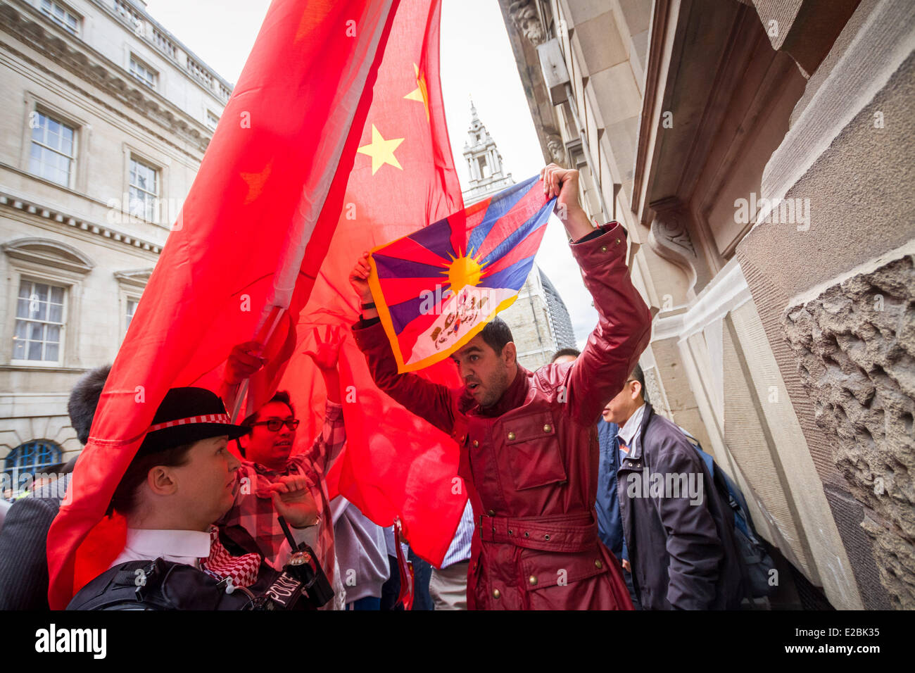 London, UK. 18th June, 2014. Free Tibet Protesters clash with pro Chinese government supporters in London Credit:  Guy Corbishley/Alamy Live News Stock Photo