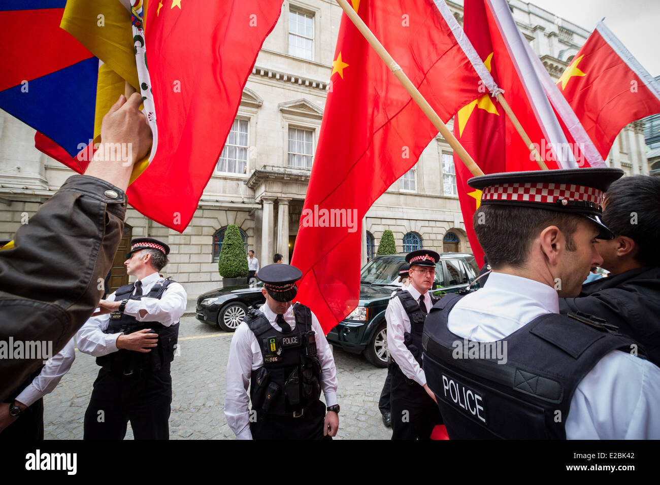 London, UK. 18th June, 2014. Free Tibet Protesters clash with pro Chinese government supporters in London Credit:  Guy Corbishley/Alamy Live News Stock Photo