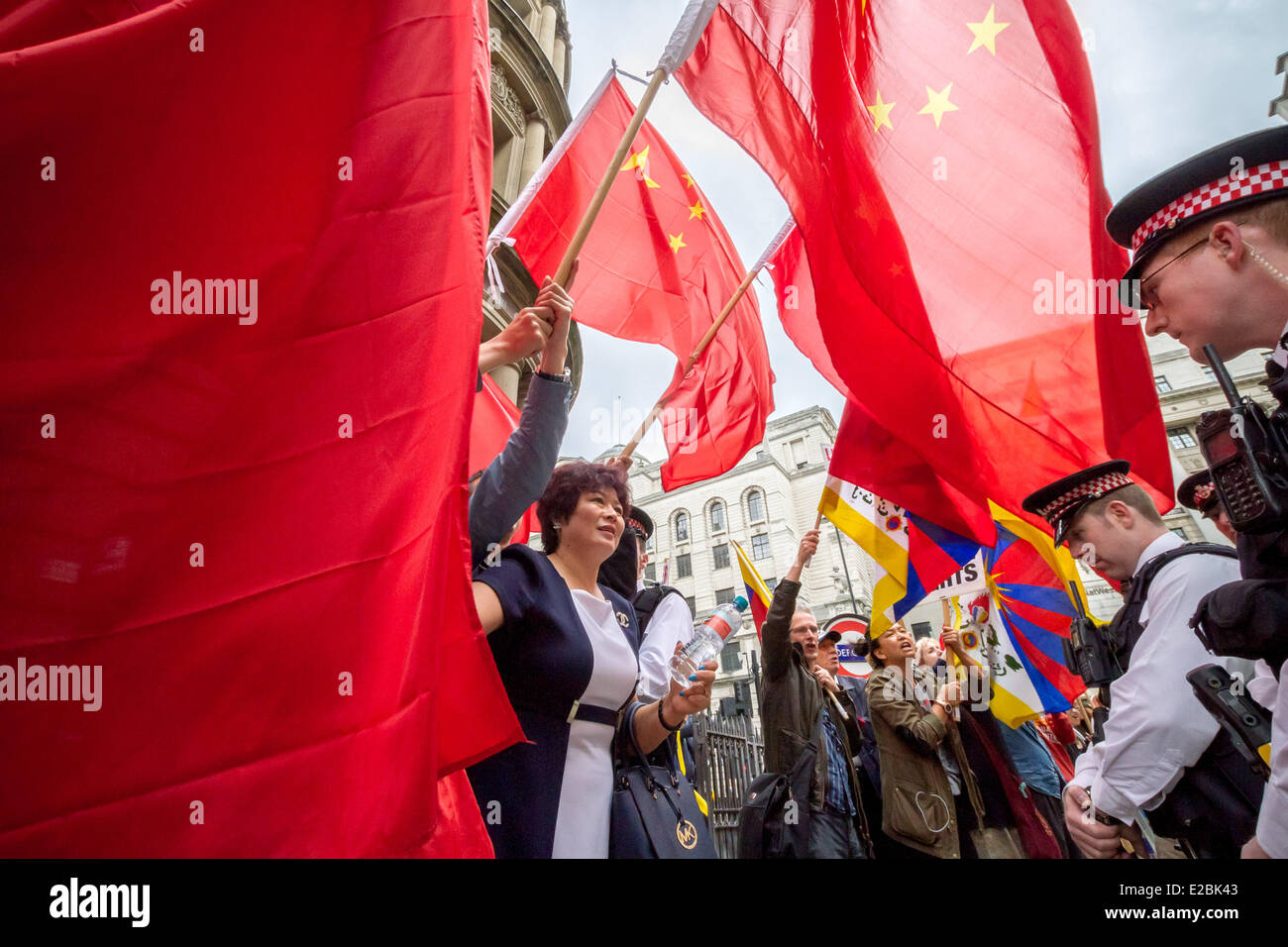 London, UK. 18th June, 2014. Free Tibet Protesters clash with pro Chinese government supporters in London Credit:  Guy Corbishley/Alamy Live News Stock Photo