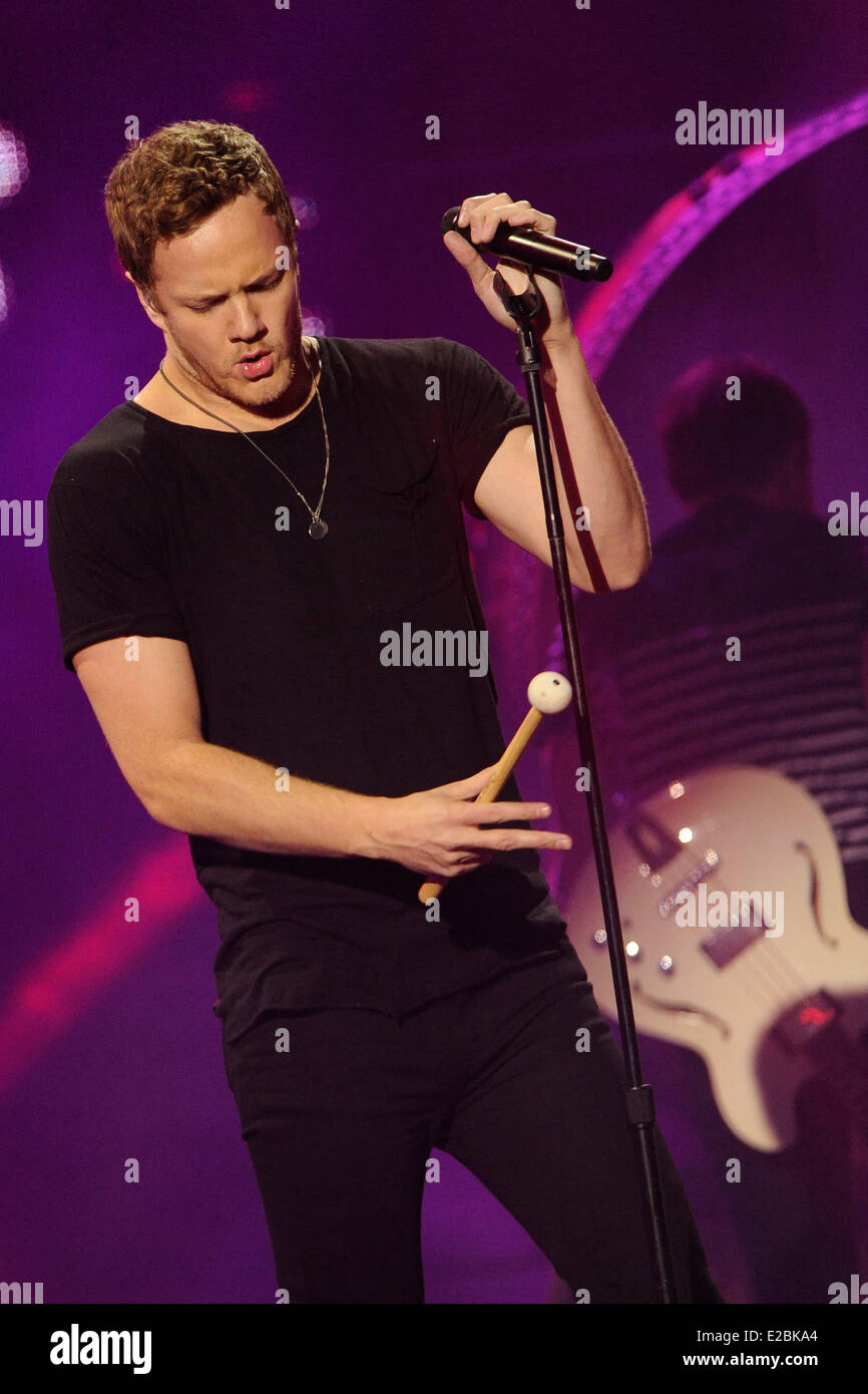 Imagine Dragons lead singer Dan Reynolds performs at the 2014 MuchMusic Video Awards (MMVA). Stock Photo