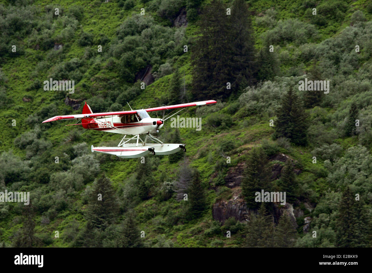 Float Plane flying through the mountains Juneau Alaska Stock Photo Alamy