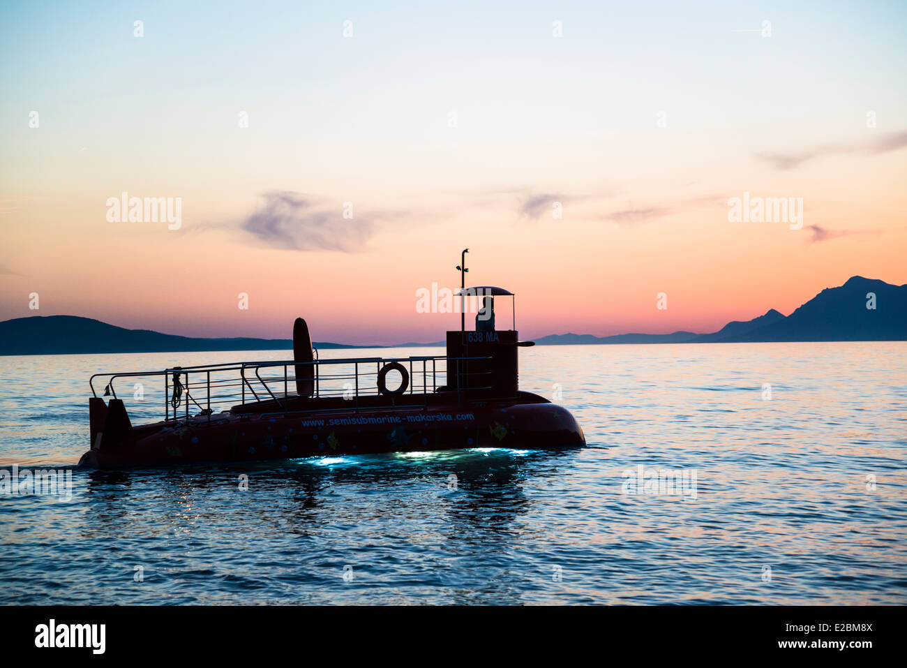 Silhouetted semi-submarine, Makarska, Croatia Stock Photo