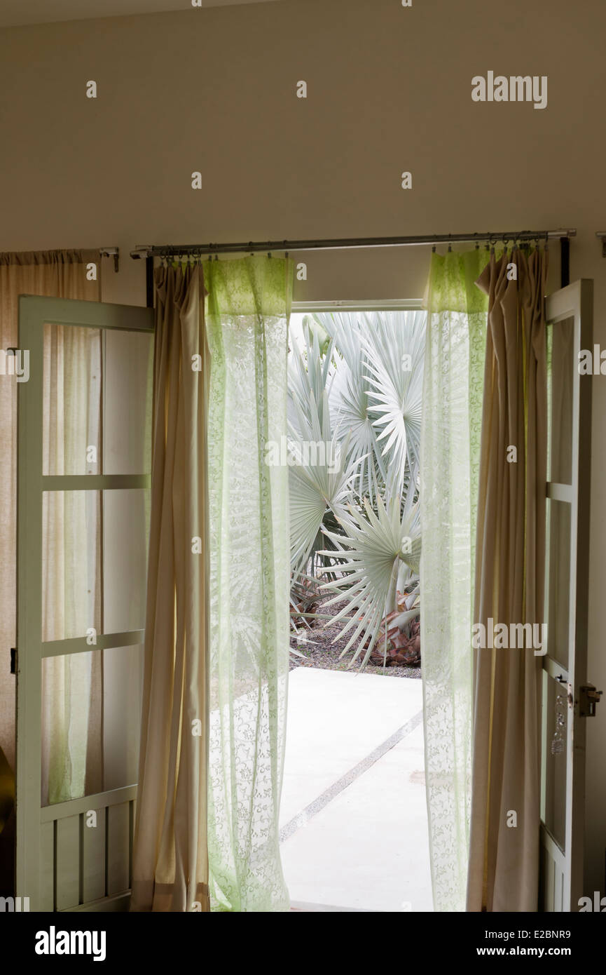 View through curtained doorway in Baja home Stock Photo
