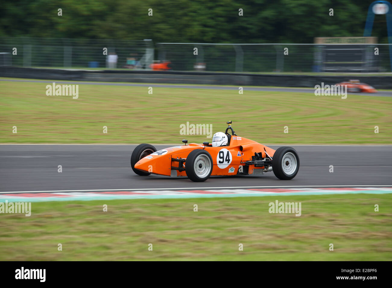 Cars racing at Castle Combe Circuit Stock Photo - Alamy