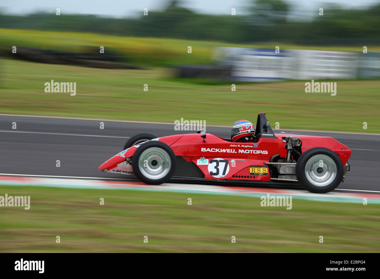 Cars racing at Castle Combe Circuit Stock Photo - Alamy