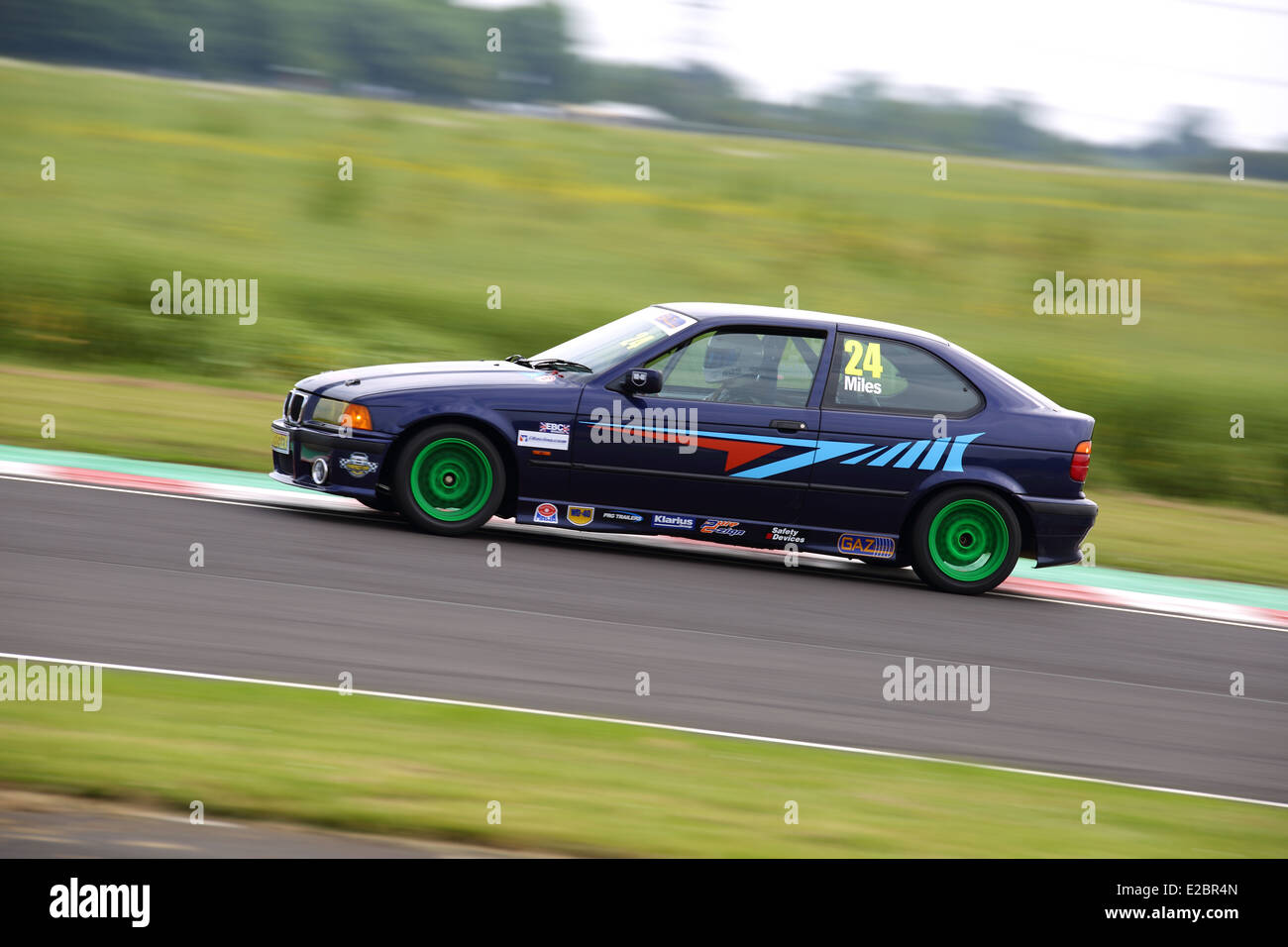 Cars racing at Castle Combe Circuit Stock Photo - Alamy