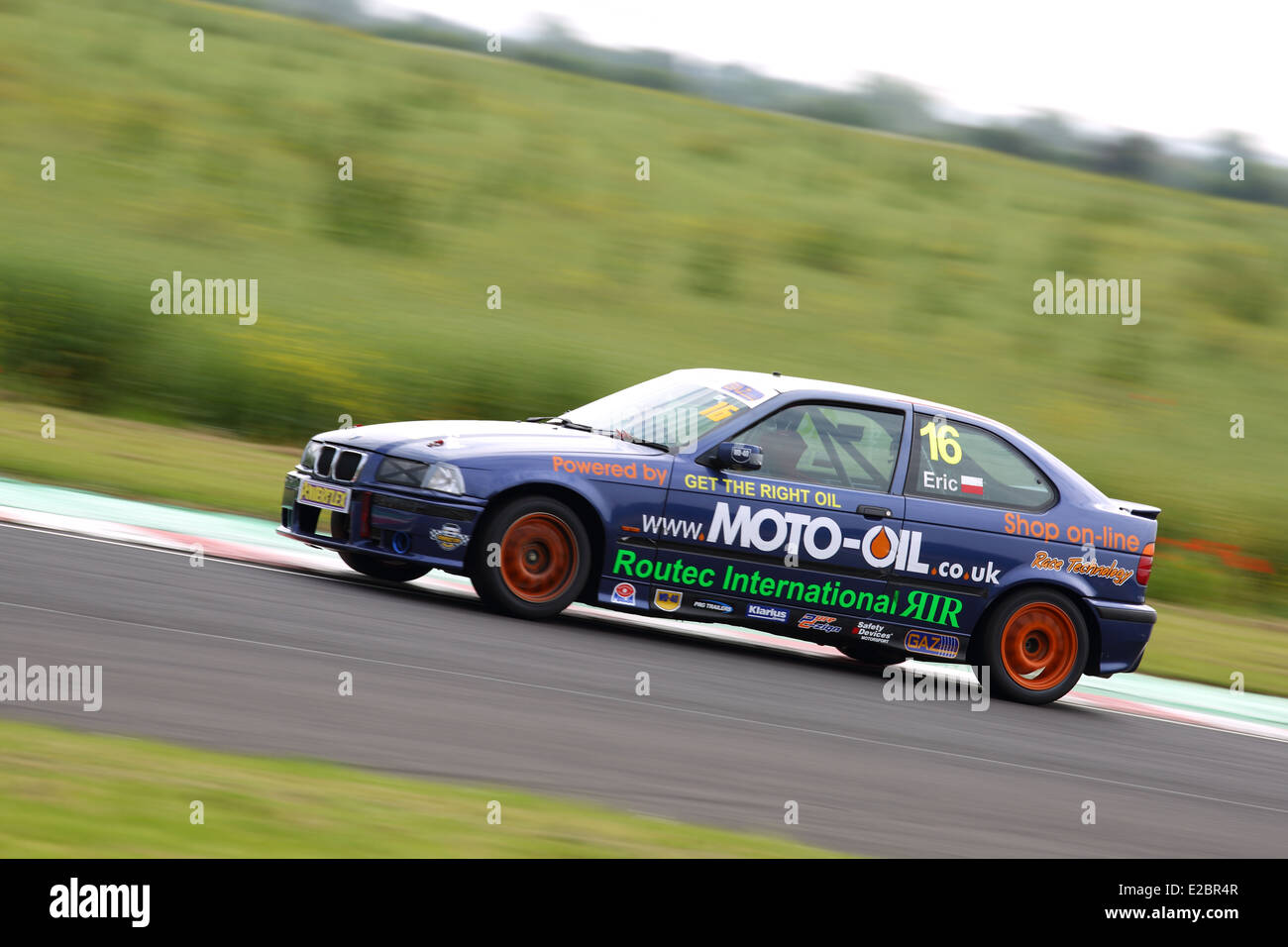 Cars racing at Castle Combe Circuit Stock Photo - Alamy