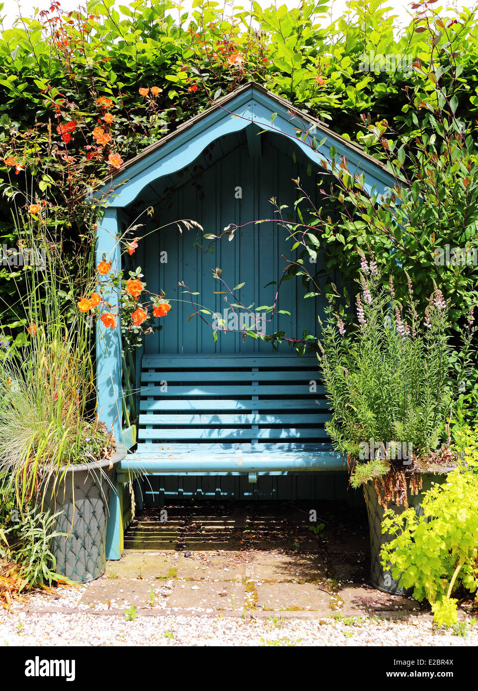 Blue painted covered garden seat hi-res stock photography and images - Alamy