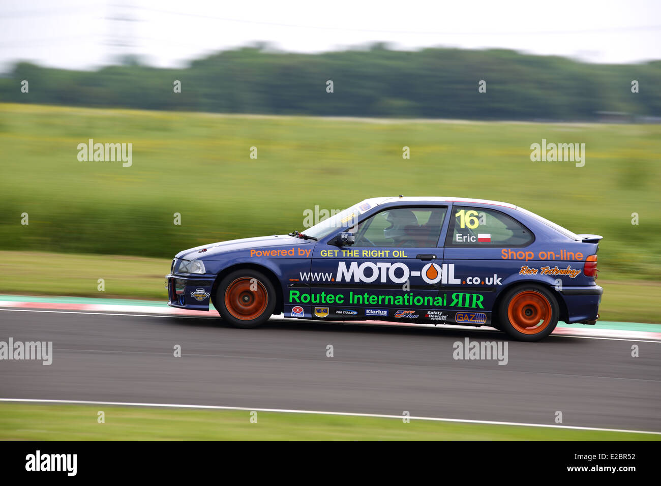 Cars racing at Castle Combe Circuit Stock Photo - Alamy