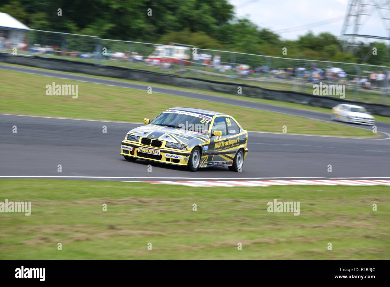 Cars racing at Castle Combe Circuit Stock Photo - Alamy