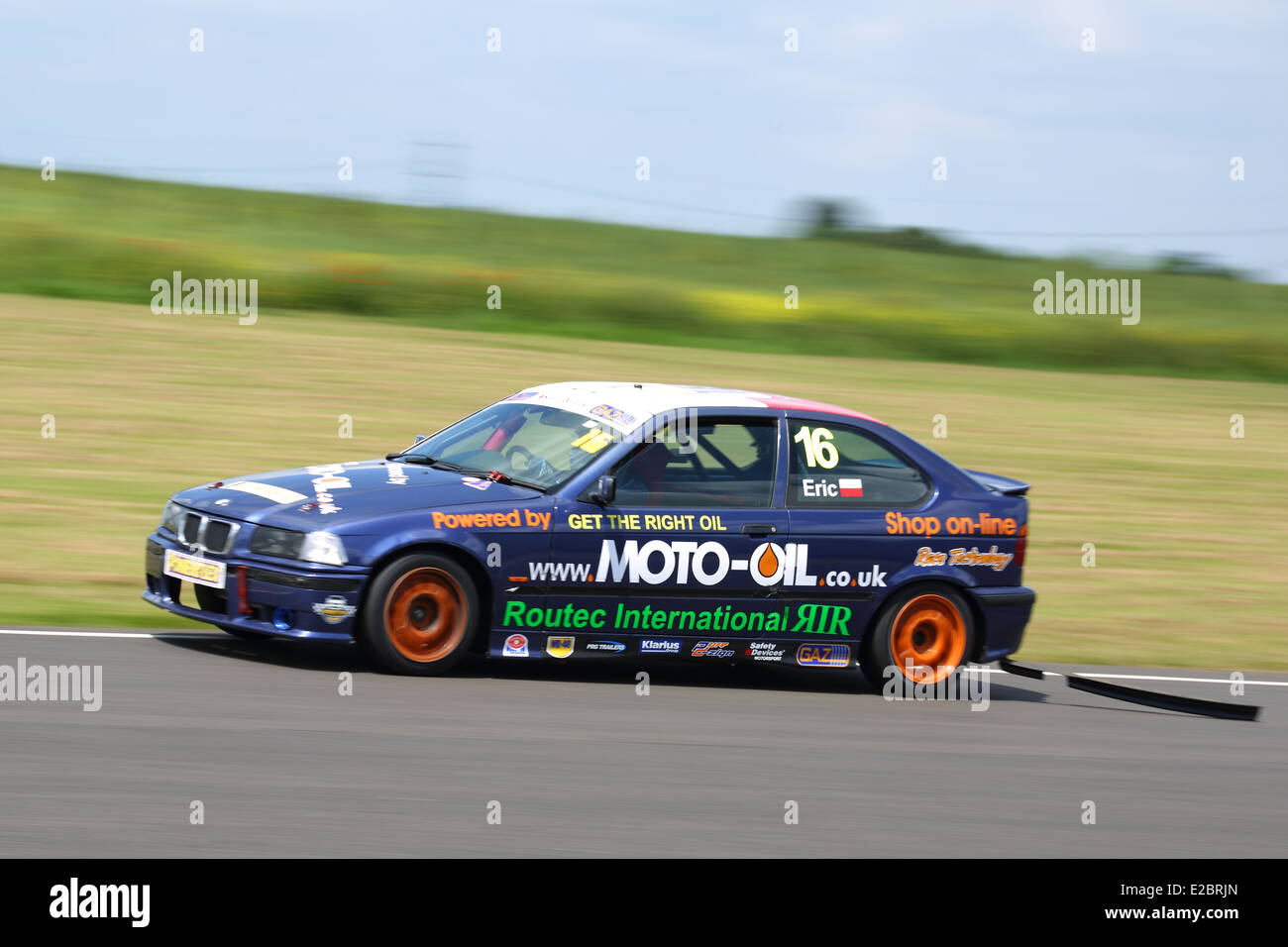 Cars racing at Castle Combe Circuit Stock Photo - Alamy