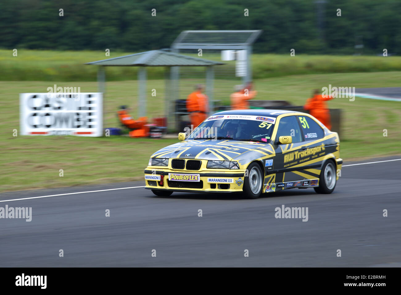 Cars racing at Castle Combe Circuit Stock Photo - Alamy