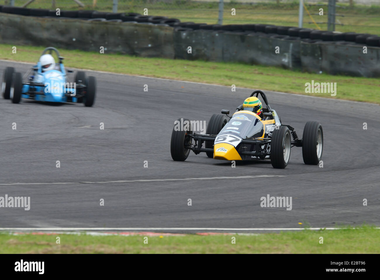 Cars racing at Castle Combe Circuit Stock Photo - Alamy