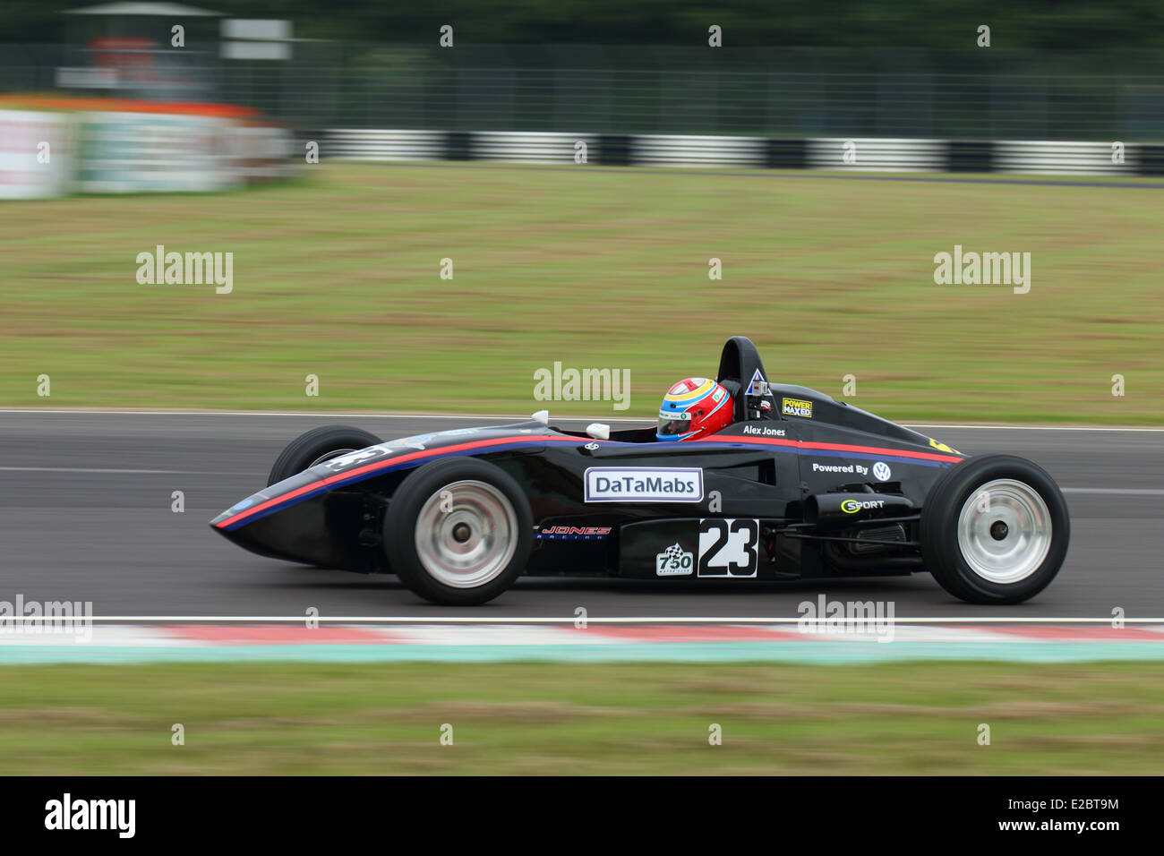 Cars racing at Castle Combe Circuit Stock Photo - Alamy