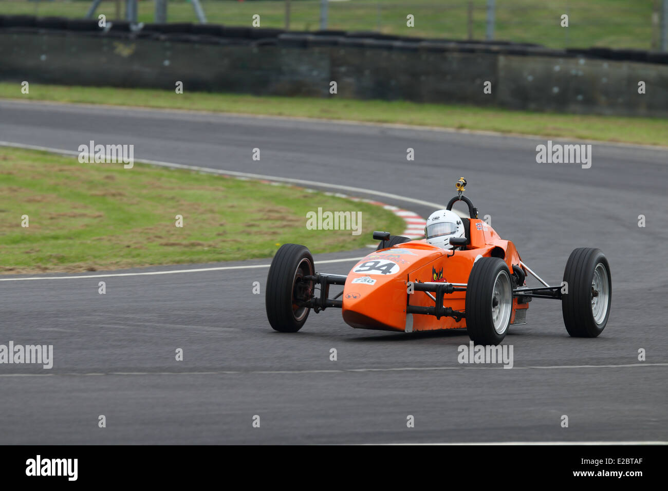 Cars racing at Castle Combe Circuit Stock Photo - Alamy