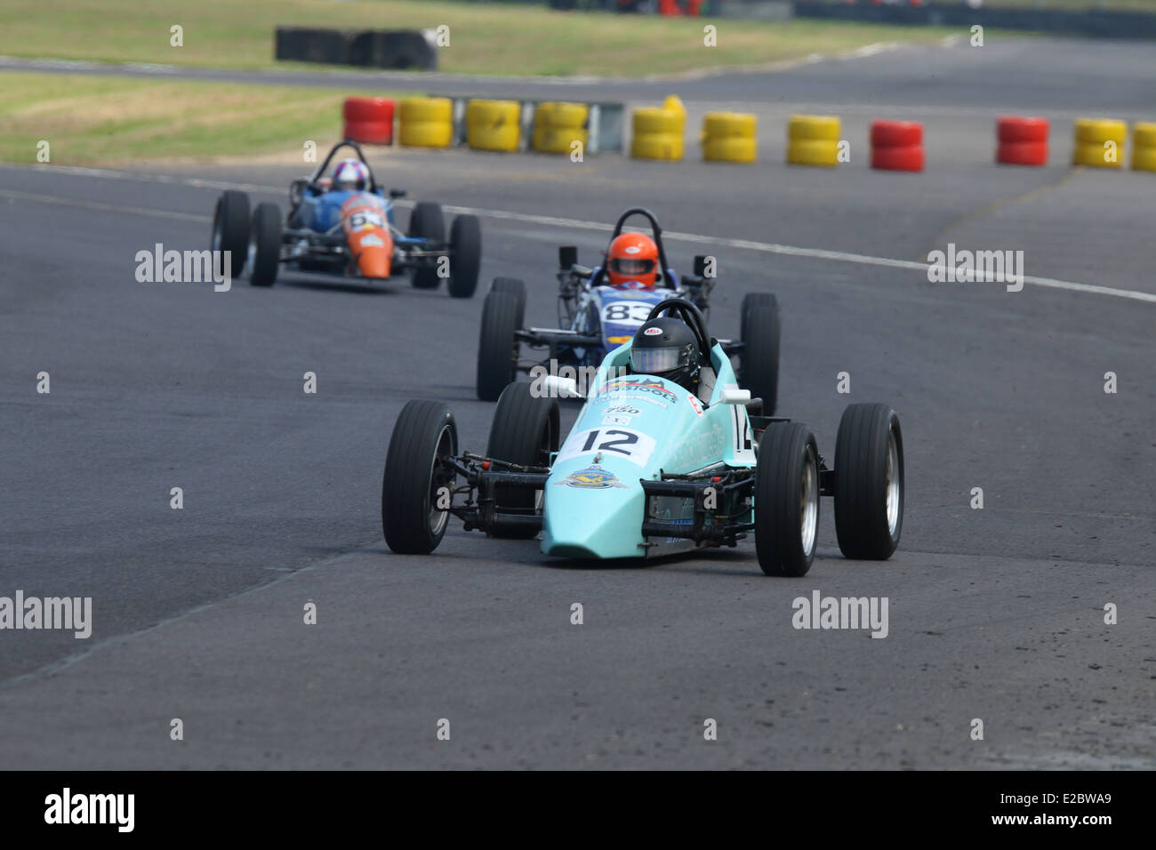 Cars racing at Castle Combe Circuit Stock Photo - Alamy