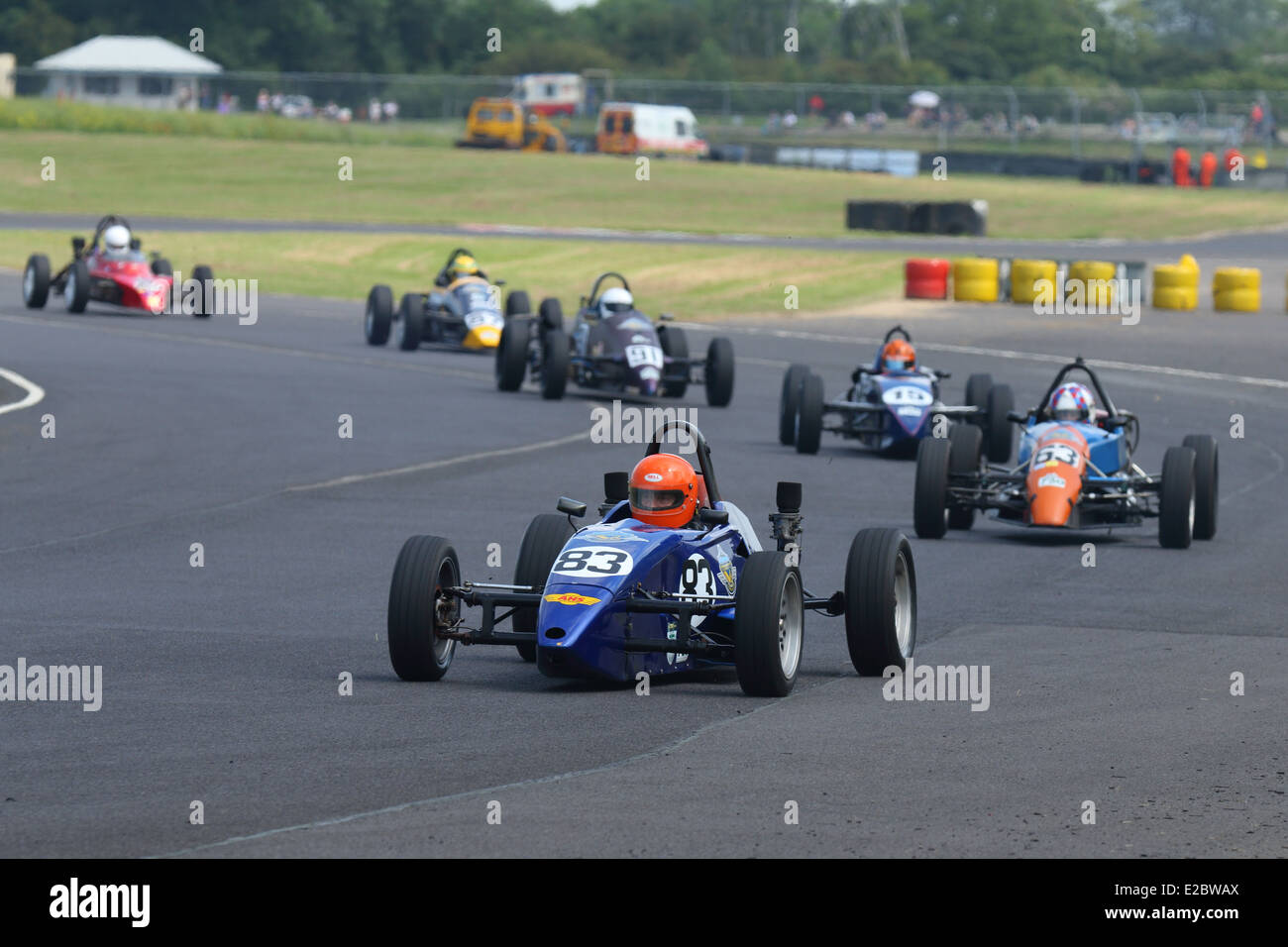 Cars racing at Castle Combe Circuit Stock Photo - Alamy
