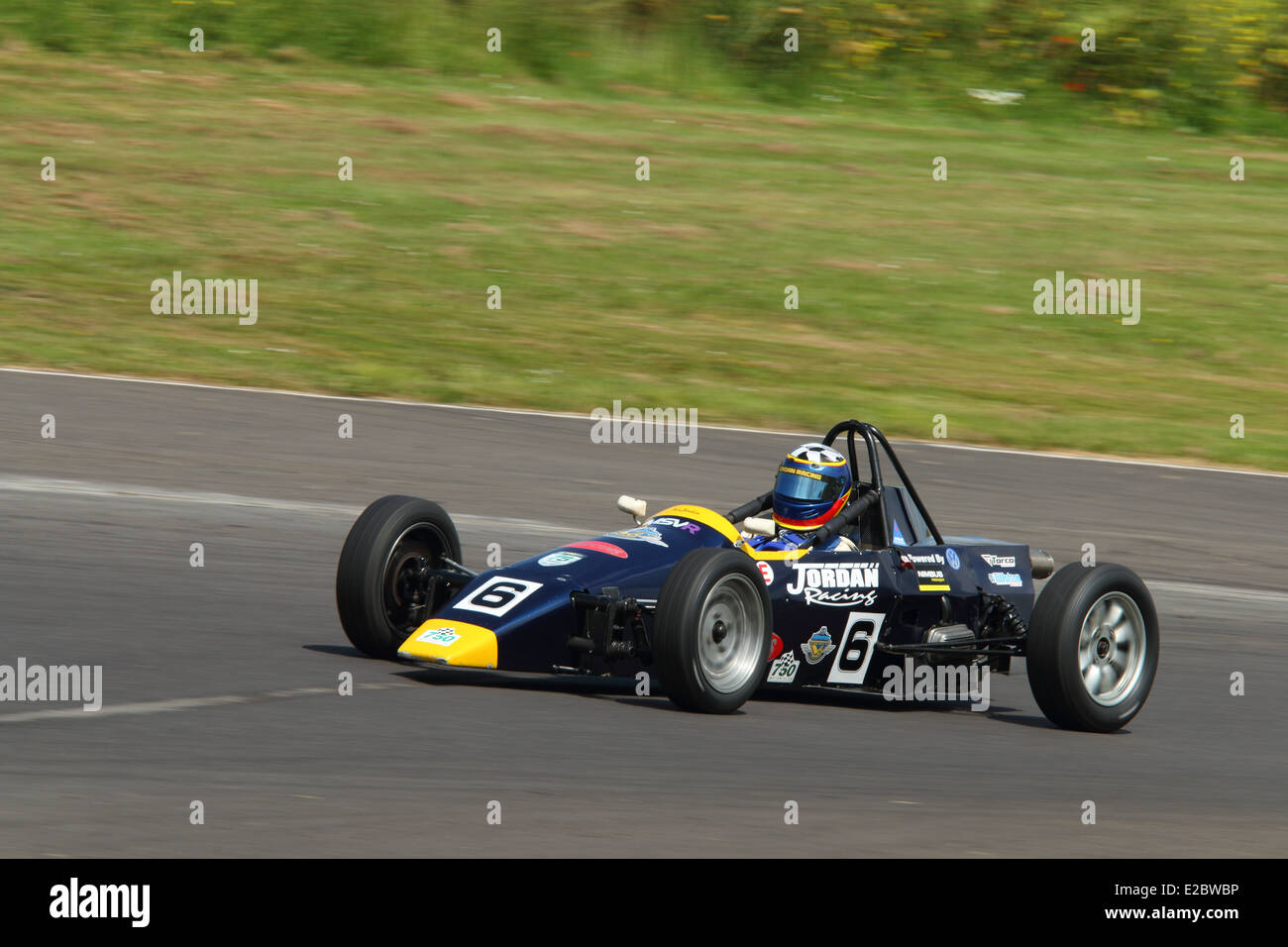Cars racing at Castle Combe Circuit Stock Photo - Alamy