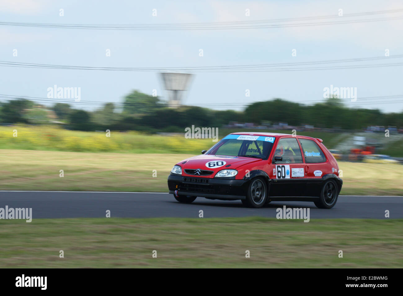Cars racing at Castle Combe Circuit Stock Photo - Alamy