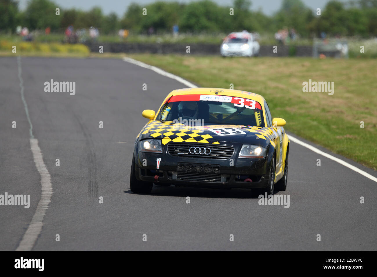 Cars racing at Castle Combe Circuit Stock Photo - Alamy