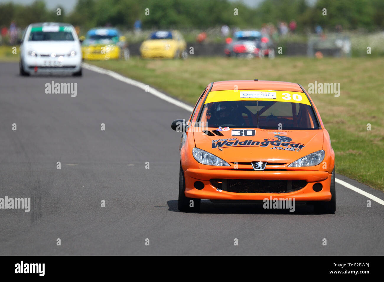 Cars racing at Castle Combe Circuit Stock Photo - Alamy
