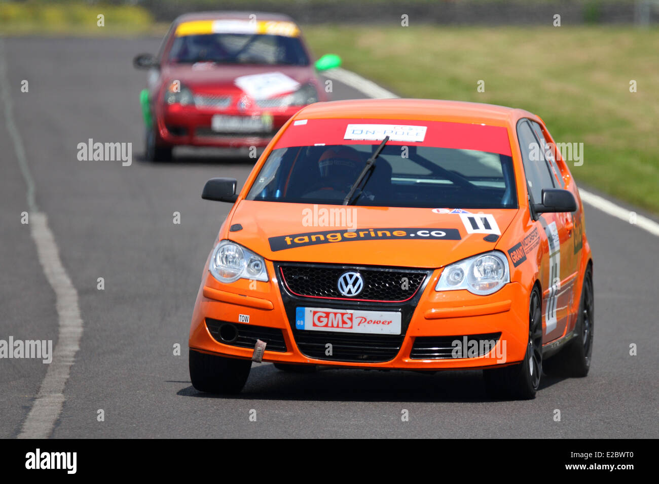 Cars racing at Castle Combe Circuit Stock Photo - Alamy
