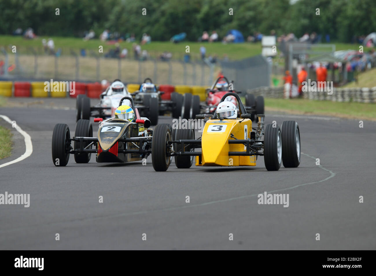 Cars racing at Castle Combe Circuit Stock Photo - Alamy