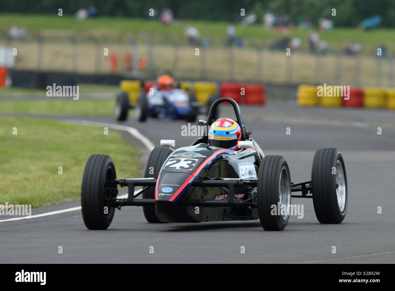 Cars racing at Castle Combe Circuit Stock Photo - Alamy