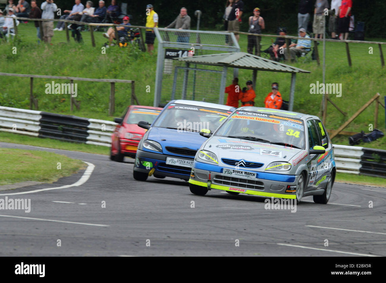 Cars racing at Castle Combe Circuit Stock Photo - Alamy